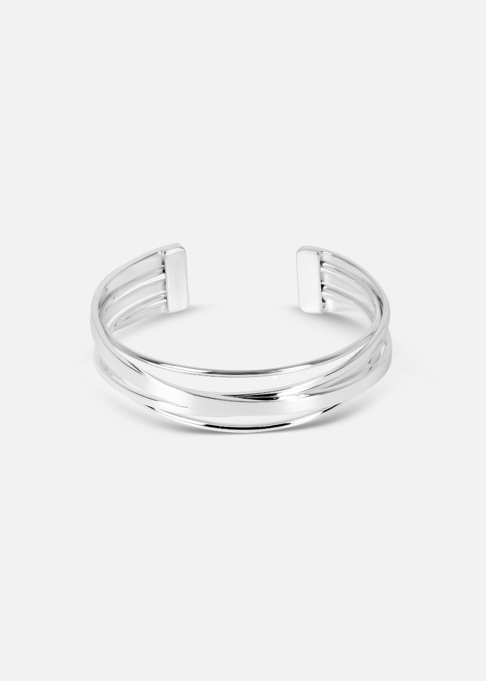 A silver cuff bracelet with multi-line detailing, displayed against a white background.