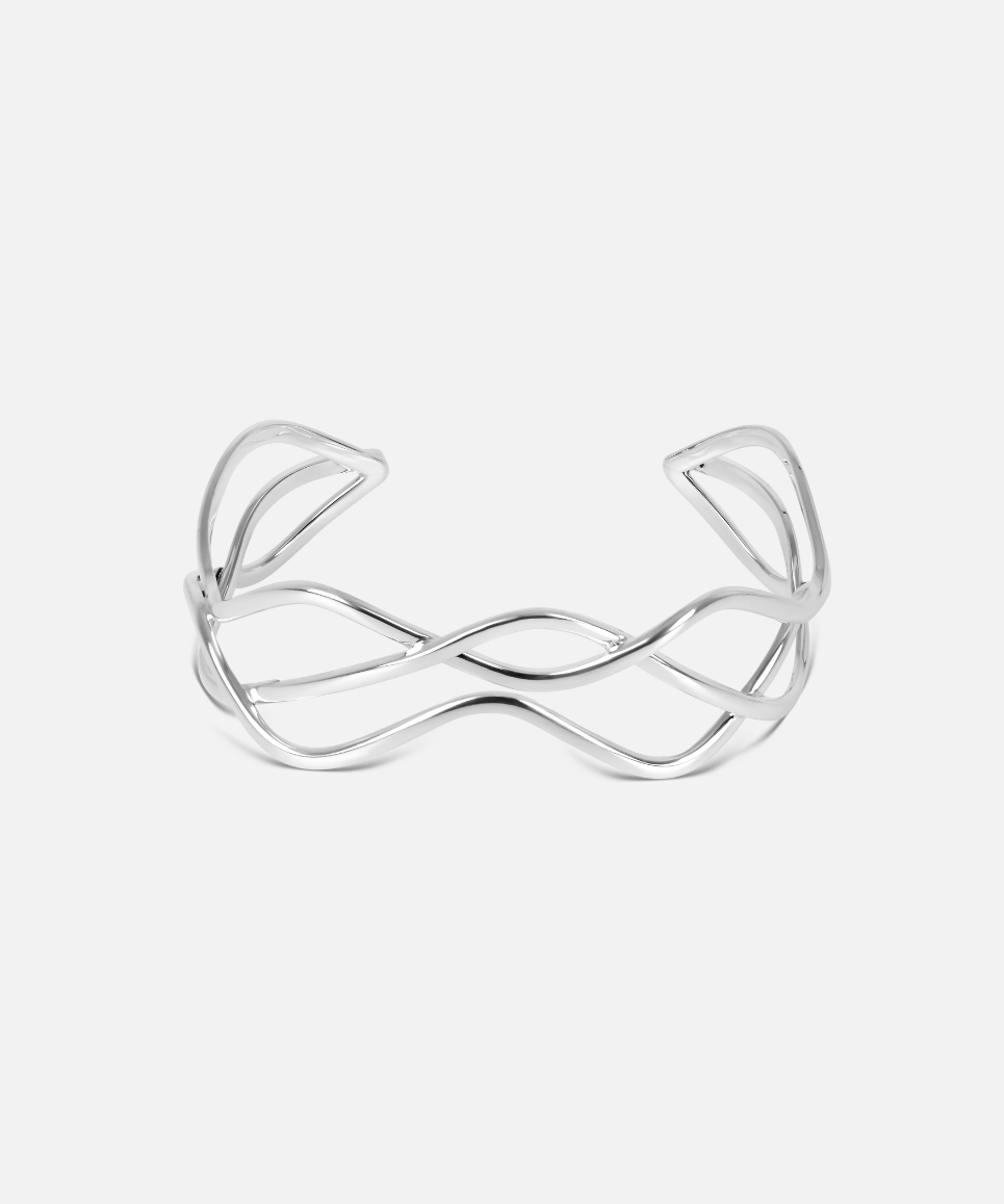 A silver cuff bracelet with a woven wire design, displayed against a white background.