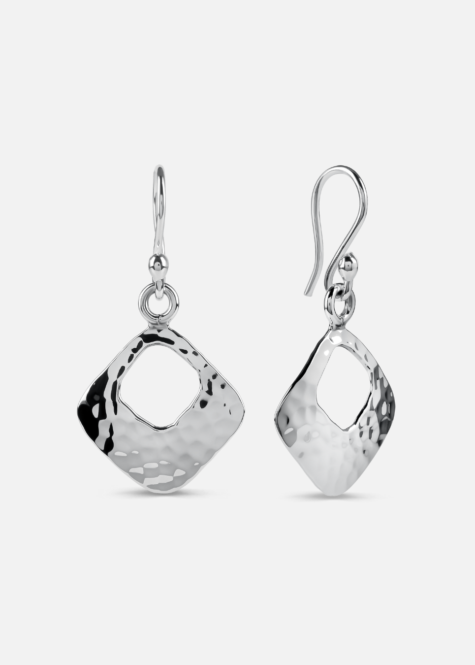 Pair of silver earrings on a white background