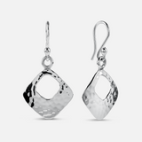 Pair of silver earrings on a white background
