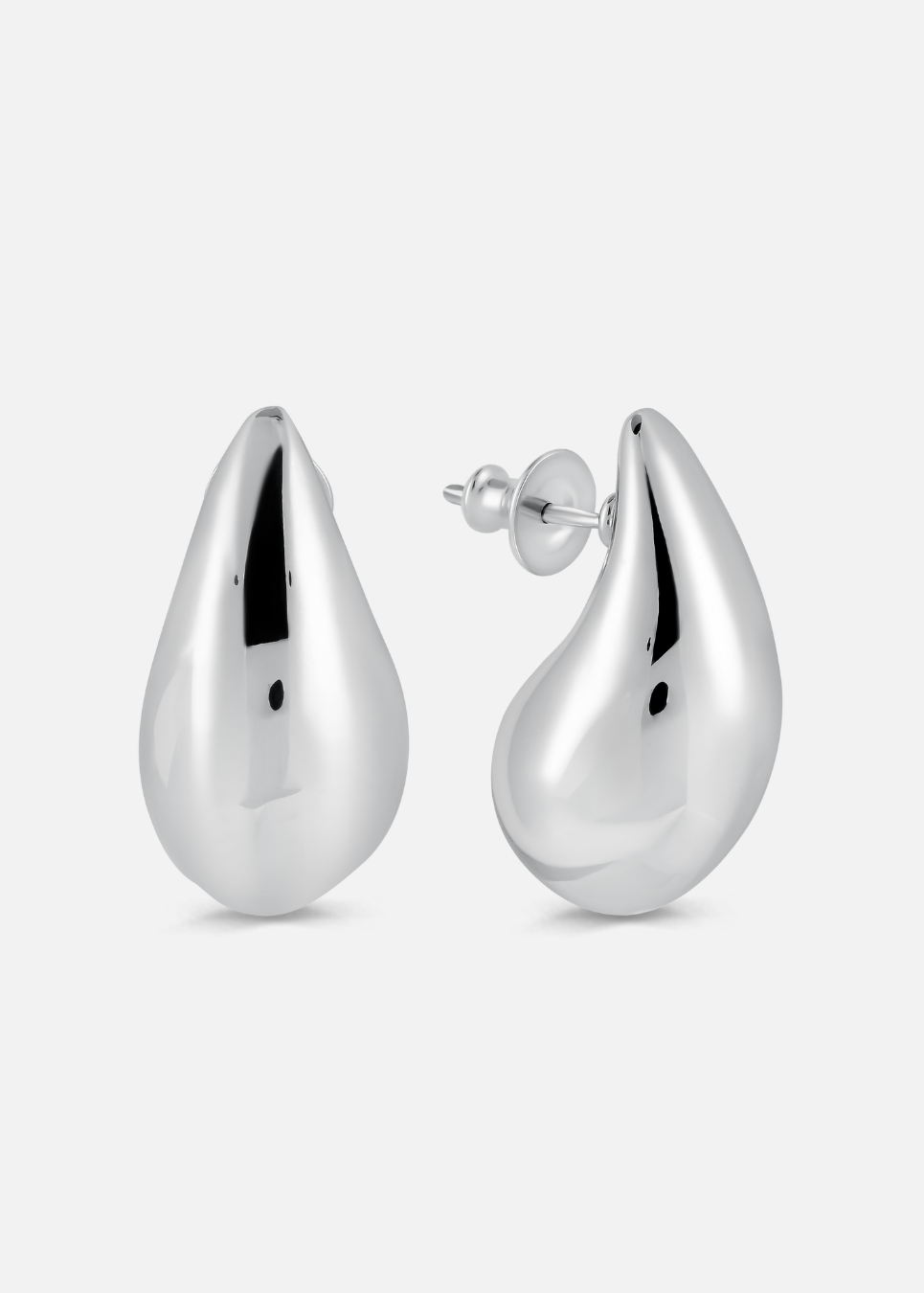 Pair of silver teardrop earrings on a white background