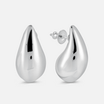 Pair of silver teardrop earrings on a white background