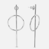 A pair of silver stud earrings featuring a circle connected to a bar by a small loop, dangling from a post.