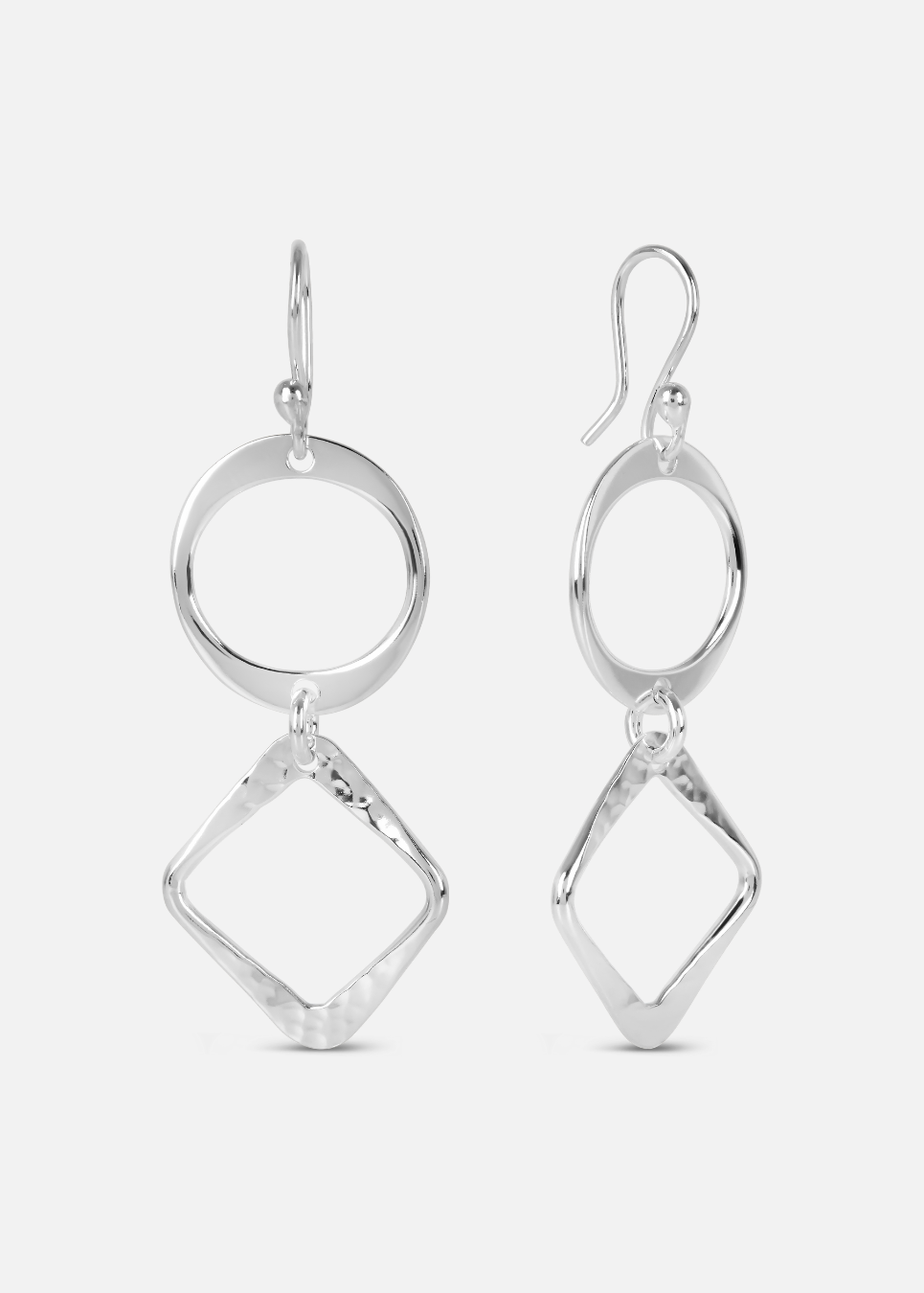 A pair of silver drop earrings with a textured design, featuring circles and squares.