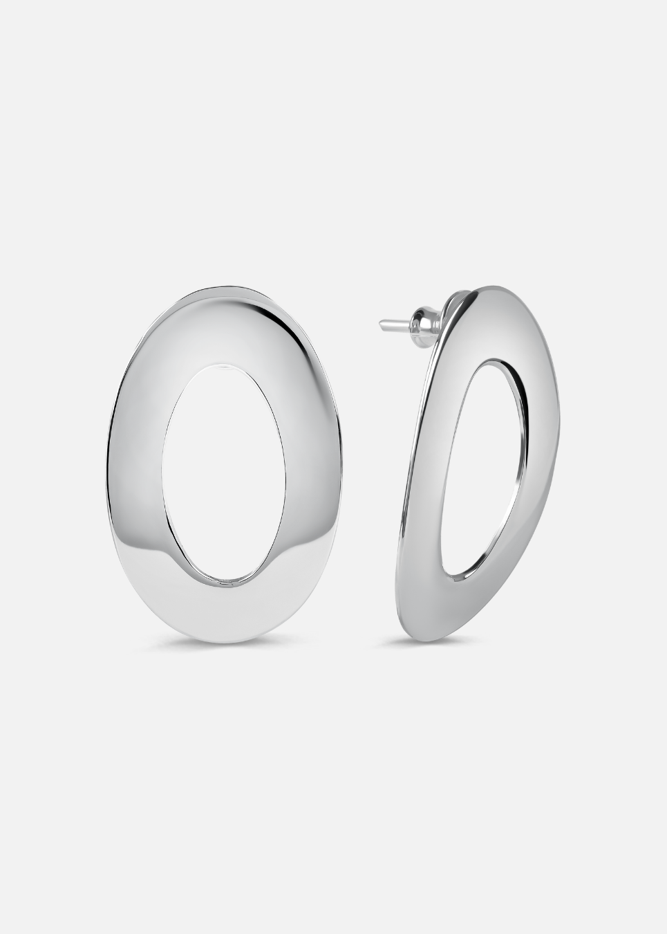 Pair of silver hoop earrings on a light gray background