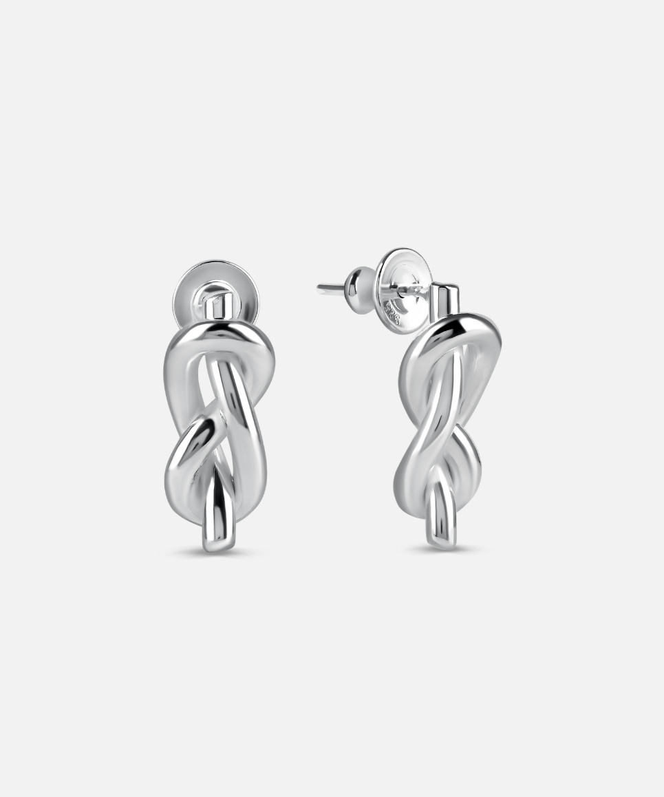 Silver twist earrings on a white background