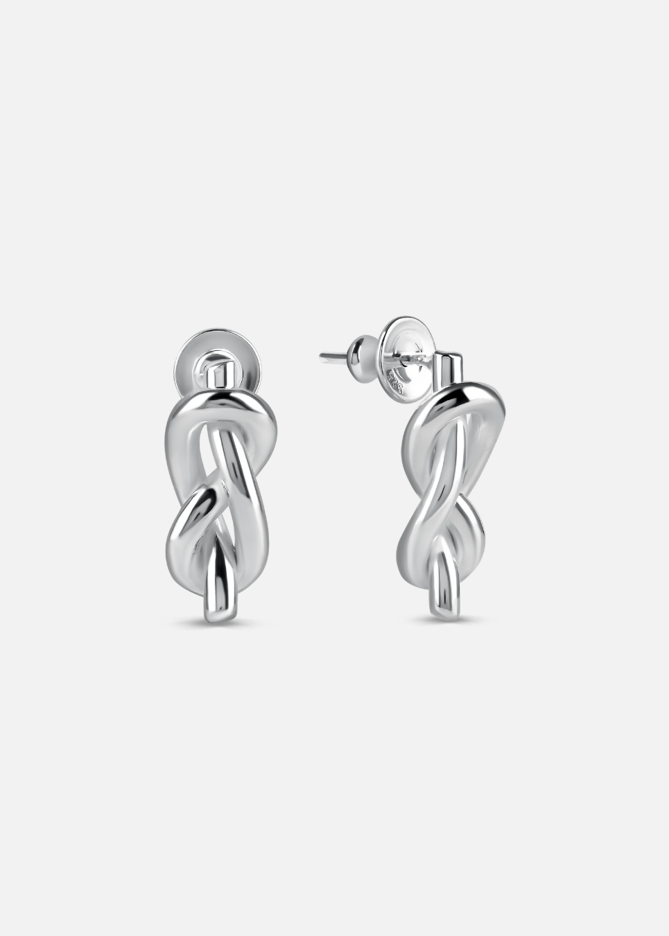 Silver twist earrings on a white background