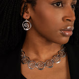 Sculptured Spirals Dangly Earrings in Sterling Silver