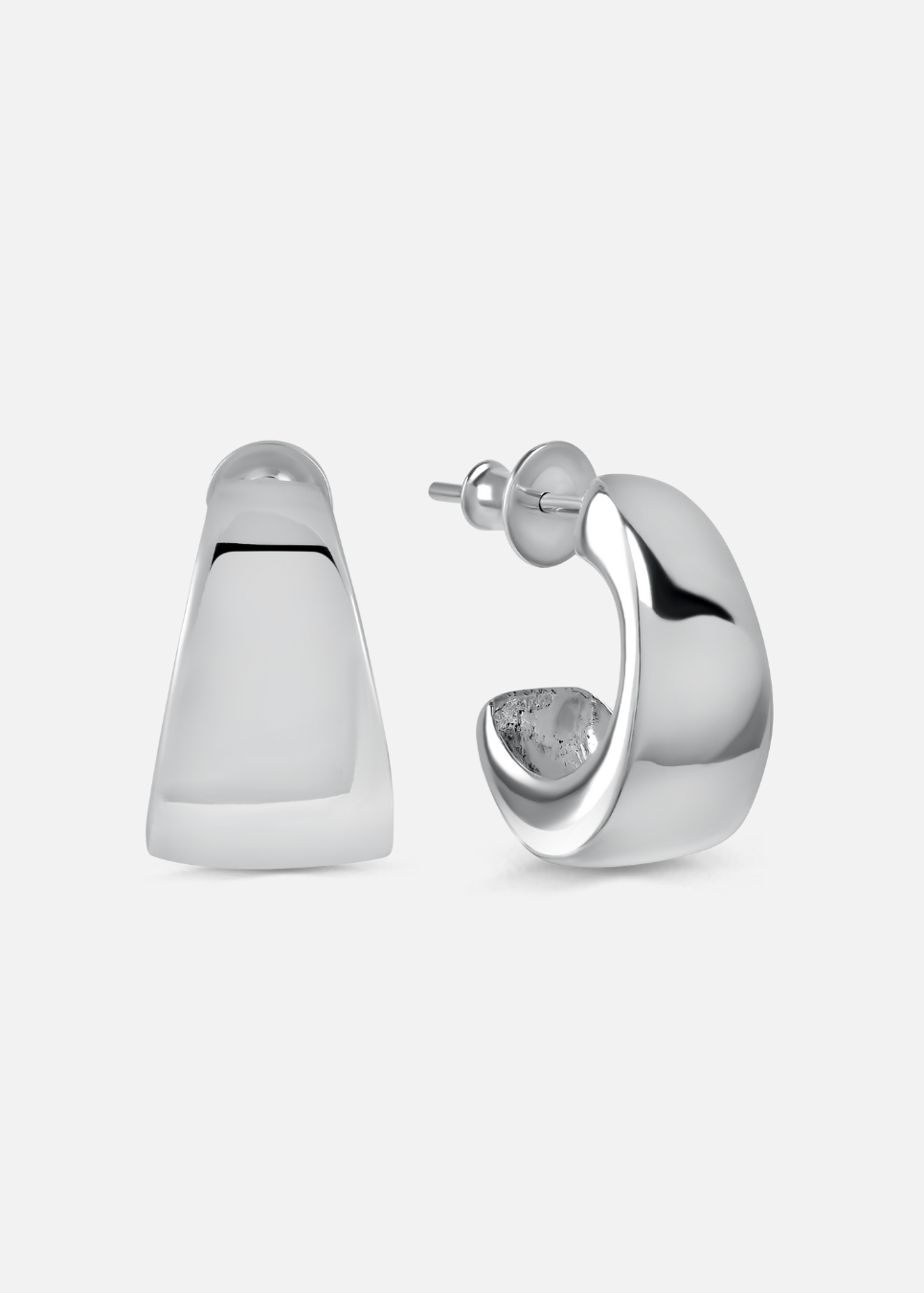 Silver hoop earrings on a light gray background