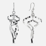 Pair of silver earrings on a white background