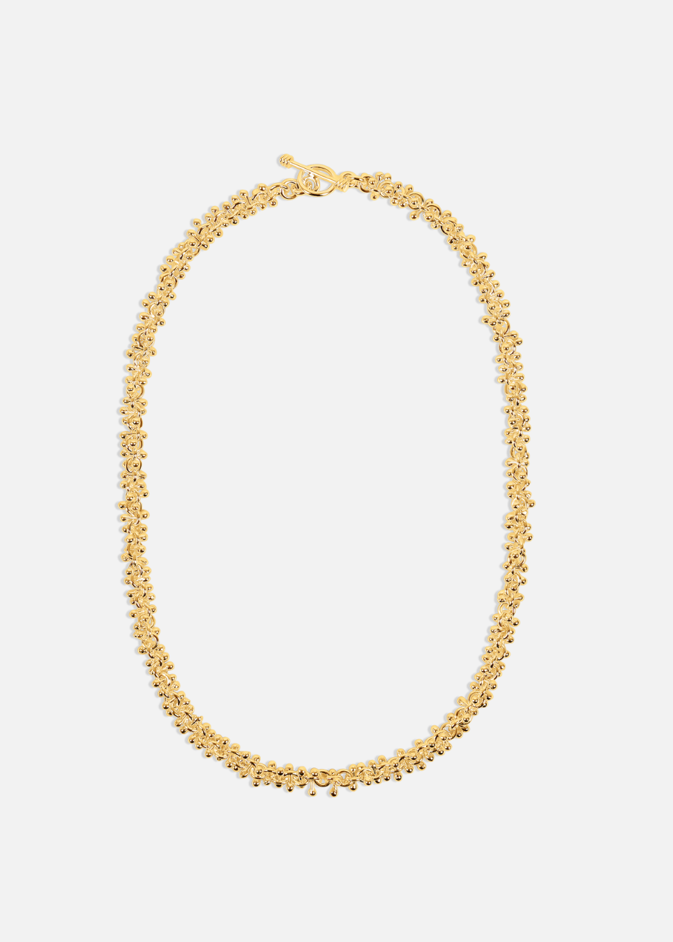Gold necklace on a white background