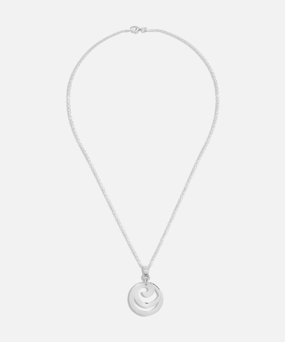 A silver spiral circle pendant necklace with a movable design on a chain, displayed against a white background.